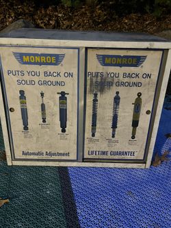 Vintage Monroe auto parts Cabinet