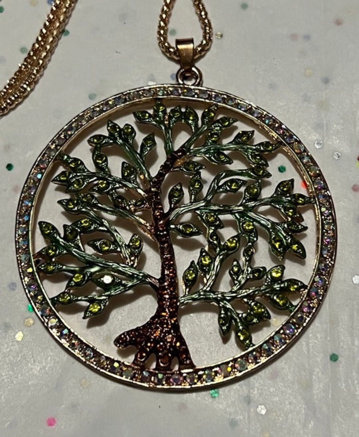 NEW Hope Tree of Life Crystal Pendant Fashion Necklace Pendant comes with a yellow gold chain which measures 28 inches.