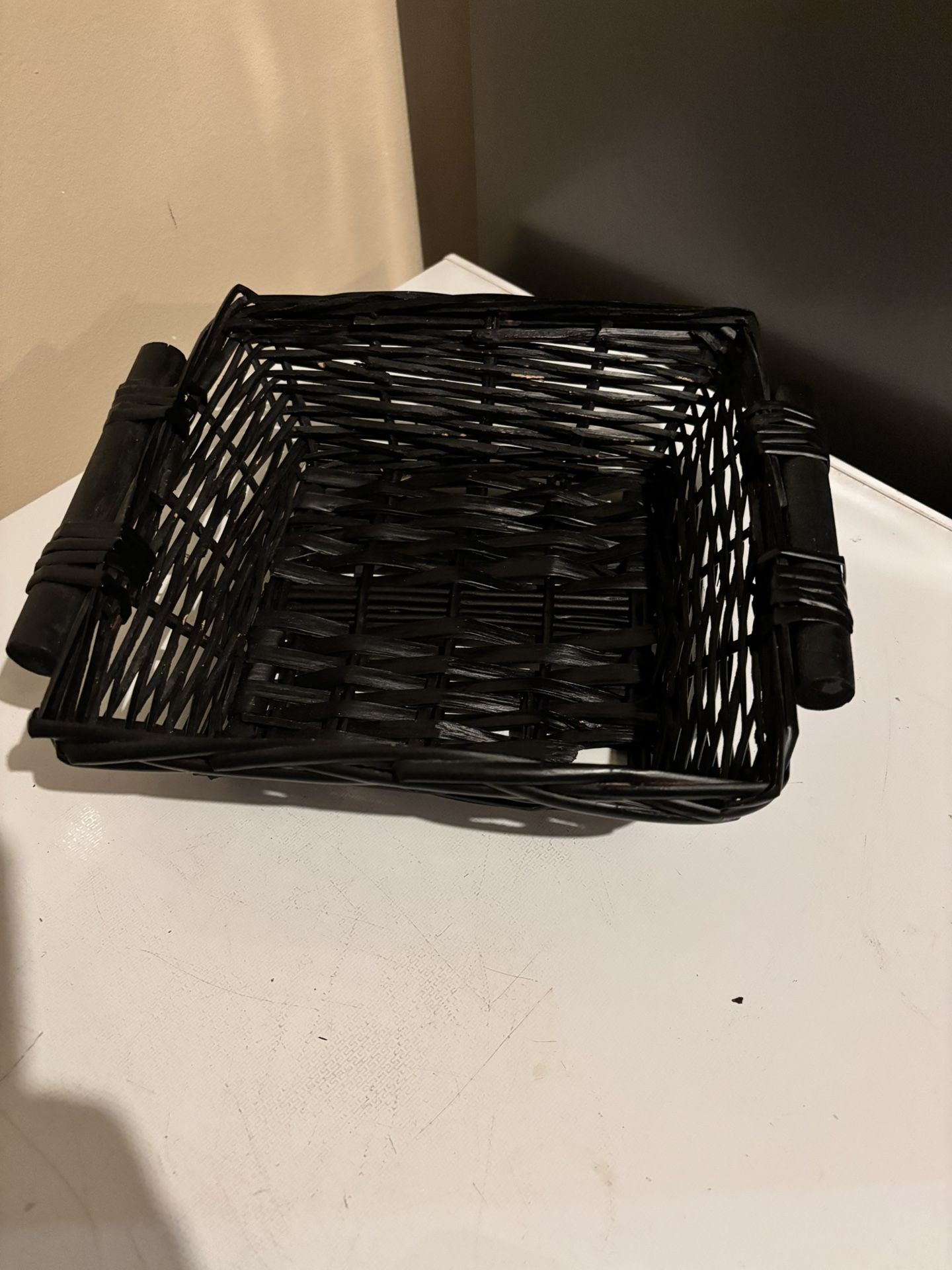 Black rectangular, plastic wicker basket