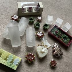 New and some slightly used (used once) candles and candle holders.  Note: One candleholder in box (with red candles) broke just as I brought it down f