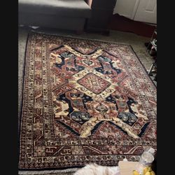 Very nice rug. Definitely handwoven origin is  Peshawar ( part of Pakistan)