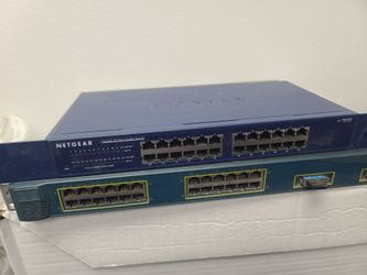 Two 24 port switches Cisco and Netgear
