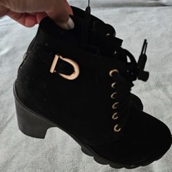 Black suede-like boots with heels