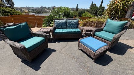 Patio furniture (love seat, 2 swivel, 2end tables, foot rest)