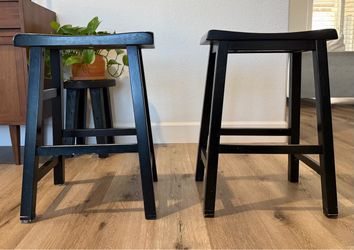 Set of 2 Black Wood Saddle Seat Stools