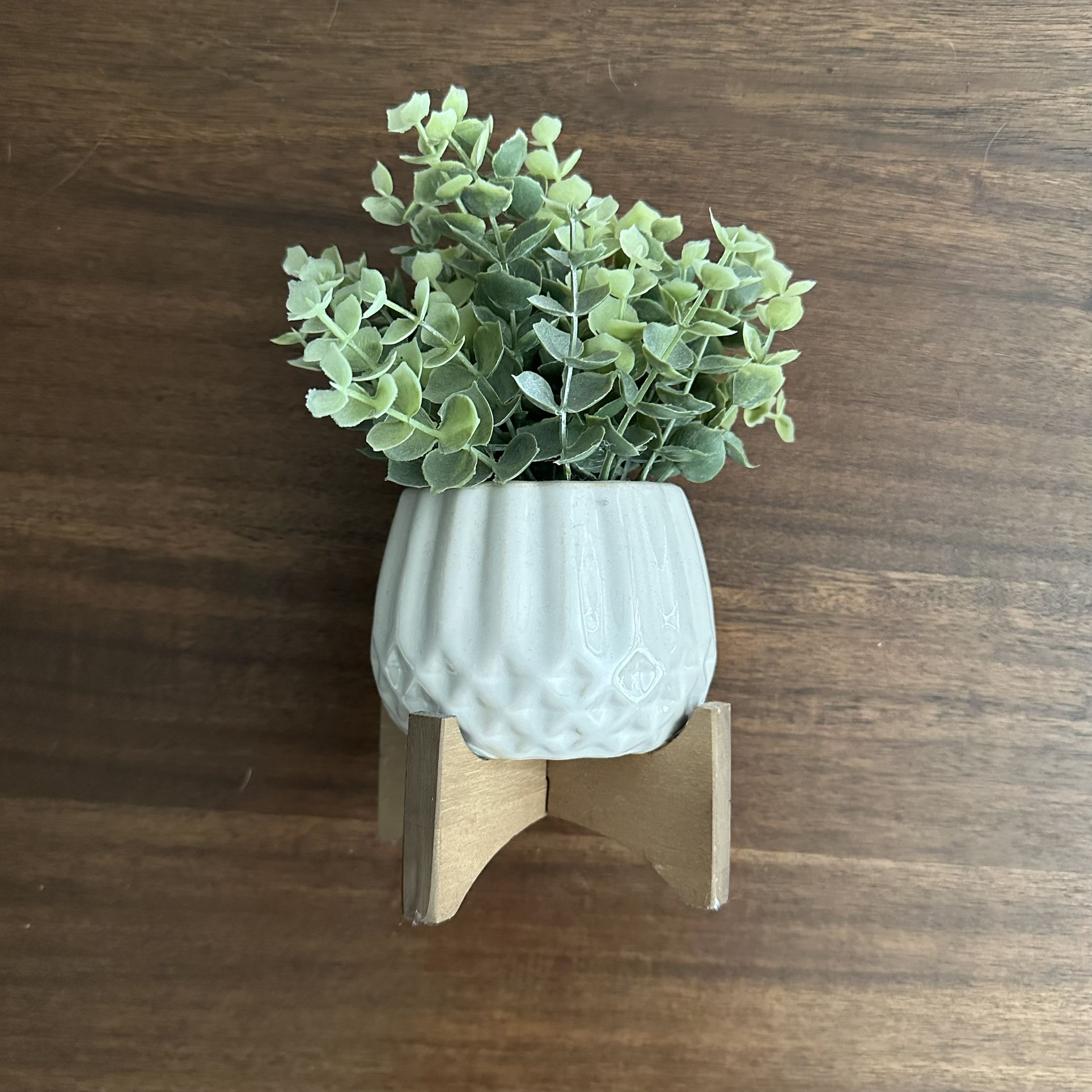 Small Fake Plant On Wooden Stand