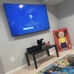 MOUNT TV ON WALL 