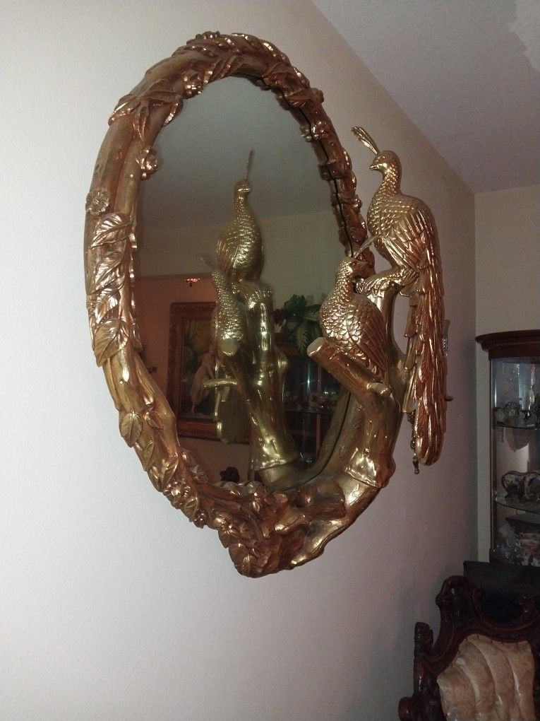 Antique gold peacock mirror