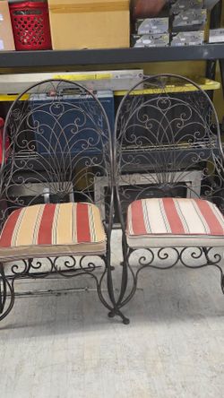 Pair of Wrought Iron Rose Motif Chairs