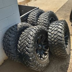 5 Tires And Wheels Off Jeep JK 