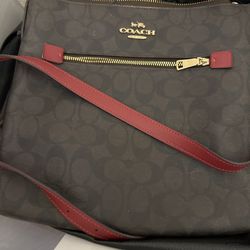 Beautiful brown and red coach cross body purse