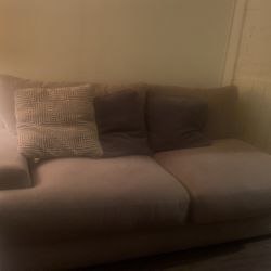 A Big. Tan. Sectional  For. Sale. N. Good Condition. Nothing. Wrong. With It. I’m Asking  Eight. To Nine Hundred. Dollars 