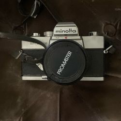 MINOLTA SR-T 202 CAMERA [Silver Body 1:28 24 mm Lens Canon Strap Bottom Mount]