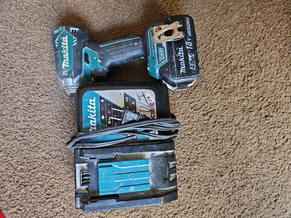 Makita Screw Gun, Battery, And Charger