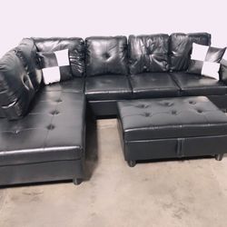 Black sectional couch with ottoman 