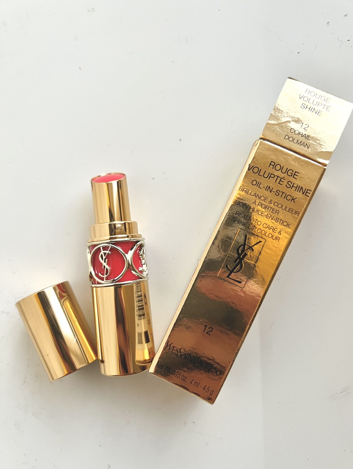 YSL Yves Saint Laurent Rouge Volupte Shine Lip Oil-in-Stick 12 Corail Dolman NIB. Box is not very good All brand new , but the lip has small