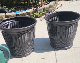 Two Tall Brown Wicker designed Planters