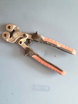Marshalltown Glass Tile Nippers with soft-grip handles and carbide cutting wheels.