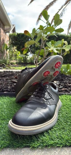 Good deal! Black FJ traditions size 11 M.