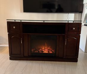 Electric tv stand/entertainment center