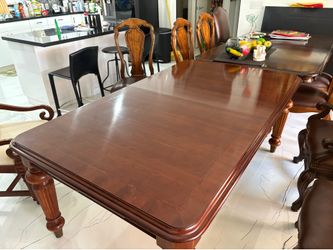 Dining table ,75” long, can be extended.