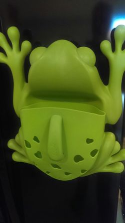 Bathtub toy holder and faucet cover