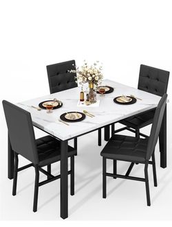 Dinning table with 4 chairs - like new