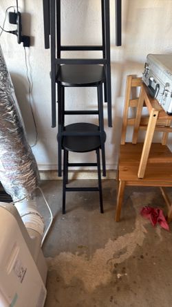 4 black barstools
