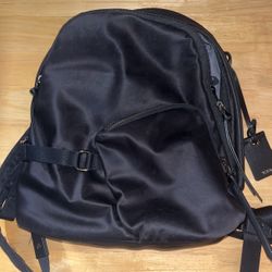 Tumi Purse/mini Backpack 