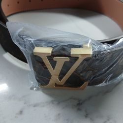 Authentic designer Louis Vuitton brown leather belt with the iconic gold LV and 24 k gold plated iconic LV buckle. Paid over $450 less than a year ago