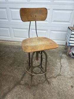 Toledo metalfurniture company antique metal stool from the 1940s. Has stickers on it which verify its authenticity.  The wooden metal are both in grea