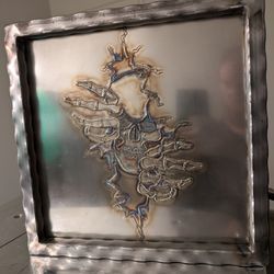 Skull Breaking Free Weld Art 