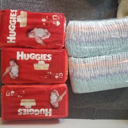 150 newborn diapers NEW NEVER OPENED