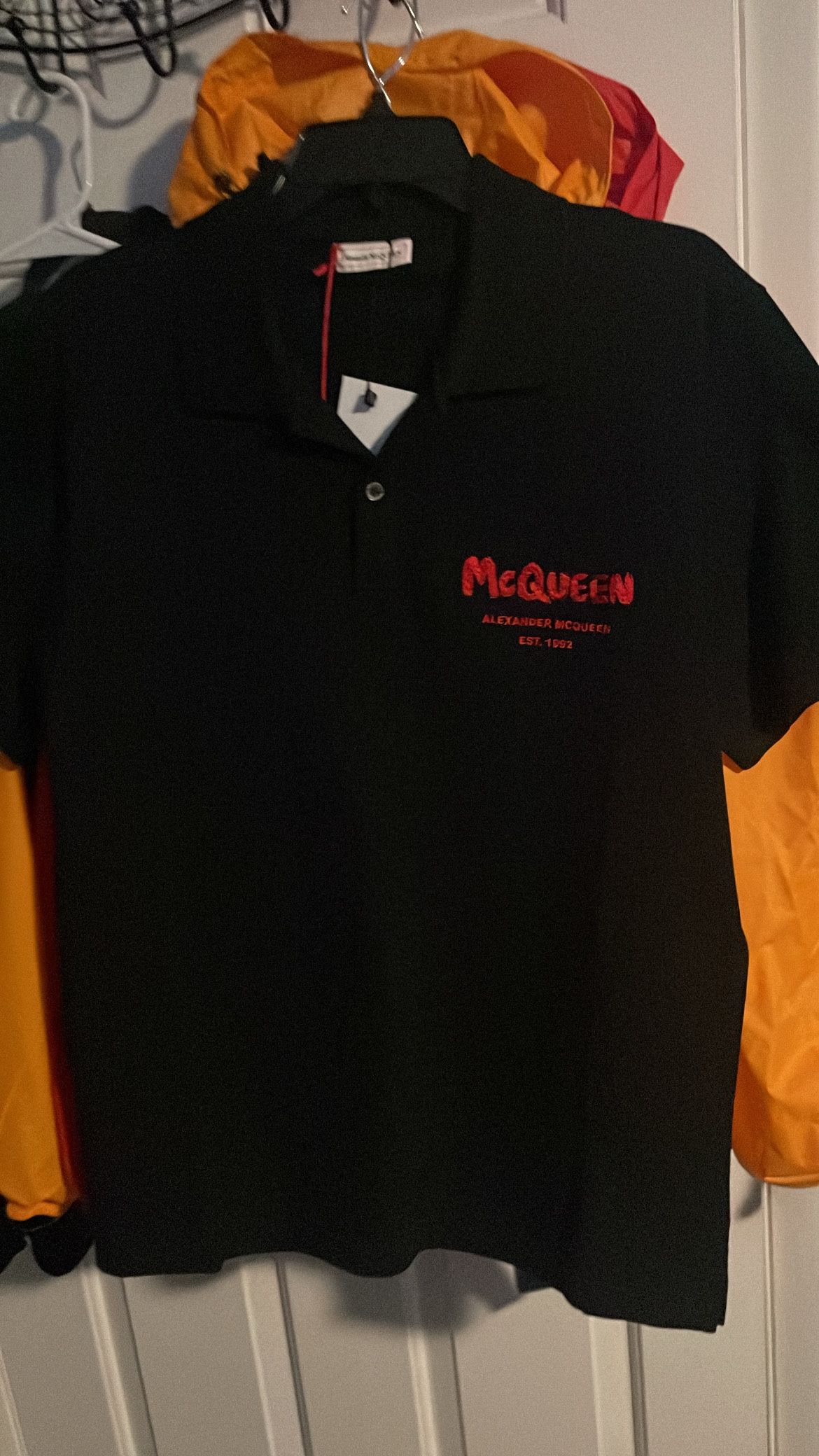 mcqueen polo $100 new with tags