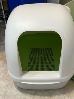 Two Tidy Cat Breeze litter boxes + supplies