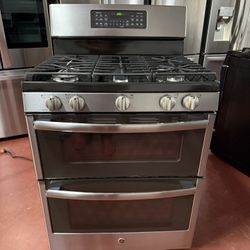GE 5-burner double-oven gas stove in perfect working condition. Delivered to your home and installed with a 3-month warranty.