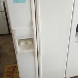 SALE Whirlpool Side By Side Refrigerator White Excellent .Warranty  . Delivery Available . 2203 Fowler St. 33901