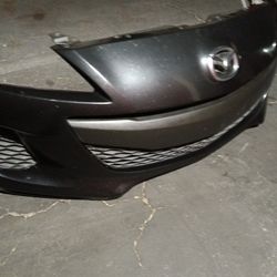 2012-2013 Mazda 3 Complete Front Bumper With All The Accessories And Inner Fillers With Accessories OEM. 