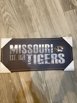 Missouri Tigers canvas print measures 12” x 26.5”.