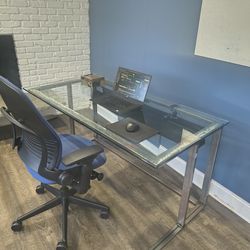 Glass top, metal frame office desk