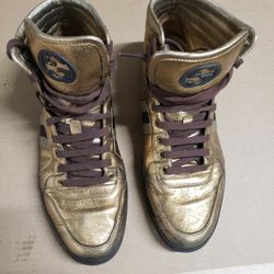 Gucci fashion high top sneakers 
in Gold finish 
Good condition 
Size 10.5 EU 11.5 US