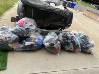 Bags of assorted used clothes