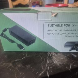 X One Cargador Nuevo $69