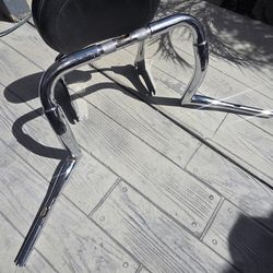 Motorcycle hand bar and back seat rest