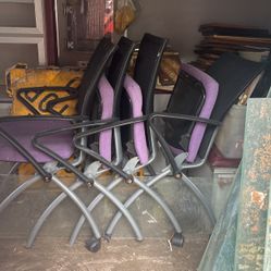 Four Purple Fold Up Chairs