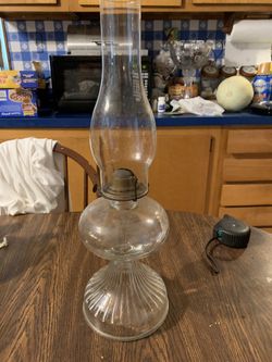 Very old oil lamp ( screws from the inside)