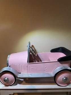 Vintage metal push-peddle car