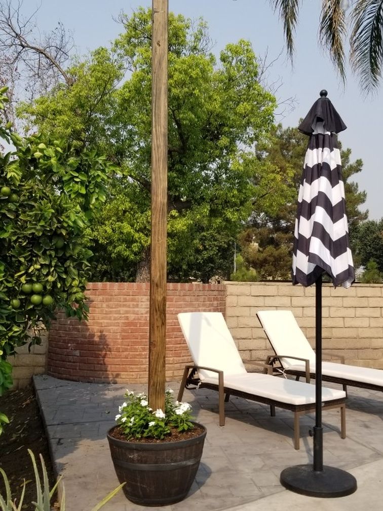 String Light Post With Wine Barrel Planter