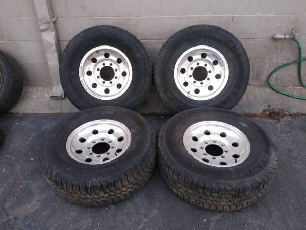Aluminum 8 lug 16 inch rims and like new tires. Dodge, Ford, Chevy
