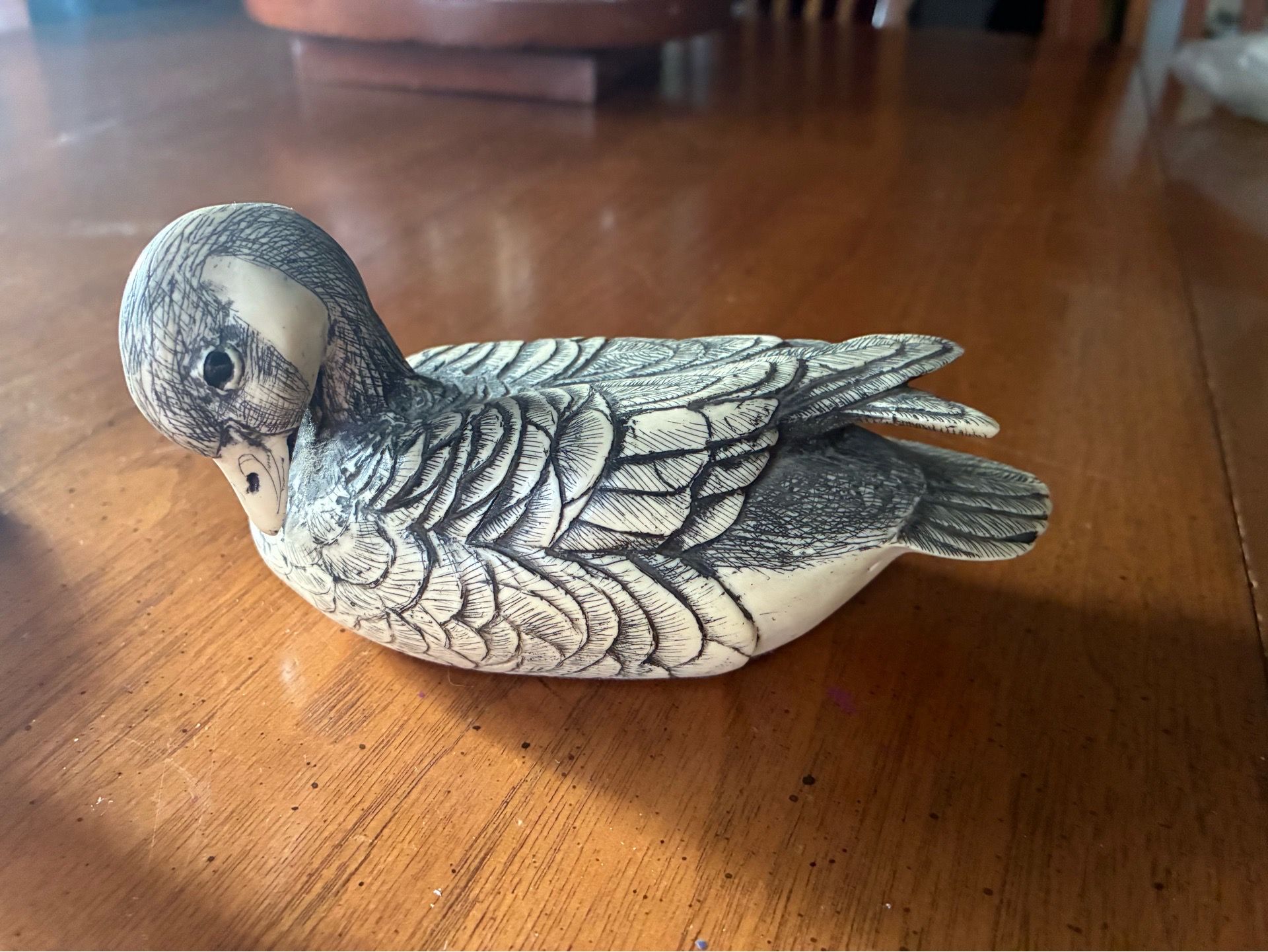 Hand carved ivory ducks